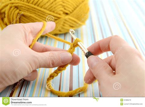 Crocheting With Brown Wool In Hand Stock Image Image Of Clothes
