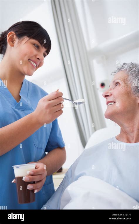 Nurse Feeding Patient Hi Res Stock Photography And Images Alamy
