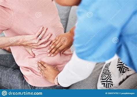 Lets See If We Can Release Some Of That Tension A Female Nurse Massaging Her Patients Back