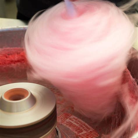 Candyfloss On A Stick In Bags Or Containers For Your Guests