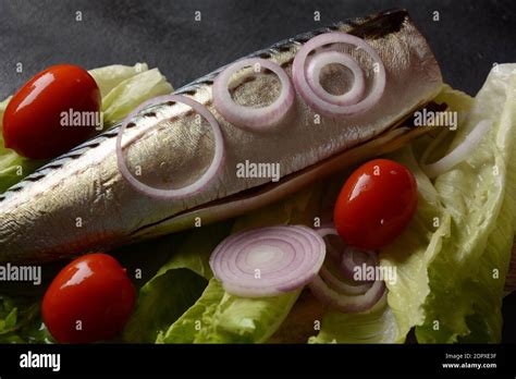 Whole Cold Smoked Atlantic Mackerel With Cherry Tomatoes And Red Onion