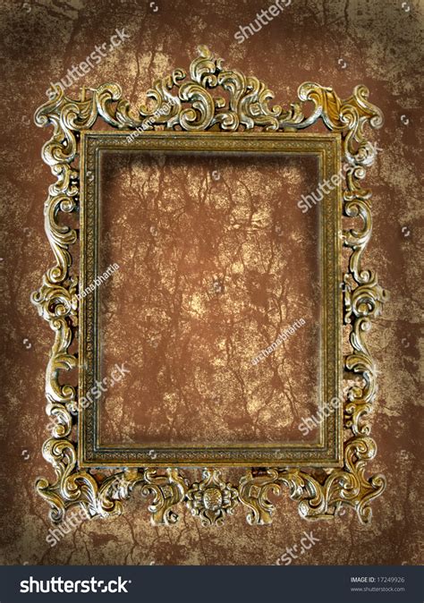 Rectangular Frame With Intricate Work On A Grunge Wall Stock Photo
