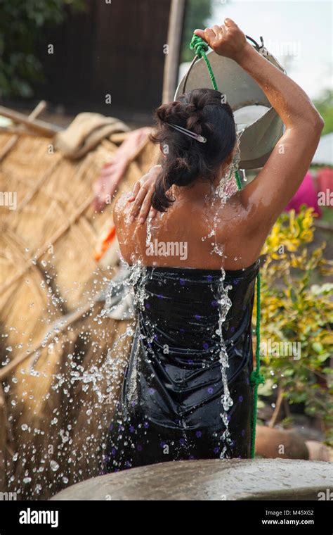 Woman Bathing In Small Town Well Outside Bagan Myanmar Stock Photo Alamy