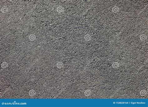 Smooth Dark Grey Asphalt Pavement Texture With Small Rocks Stock Photo