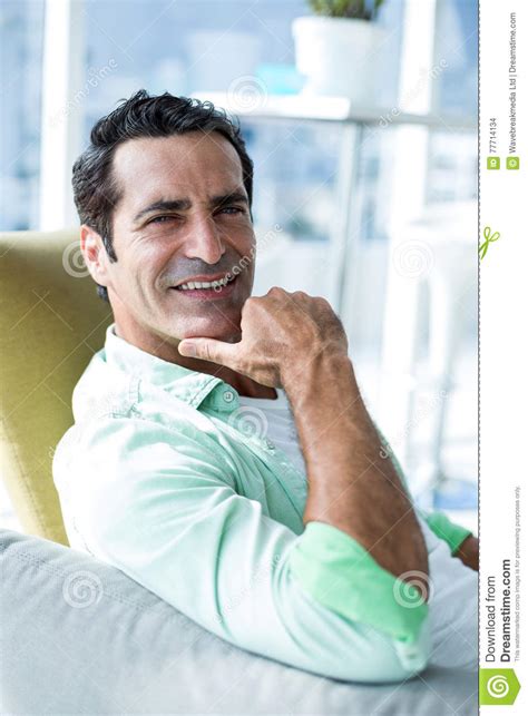 Portrait Of Man With Hand On Chin Stock Photo Image Of Lifestyles