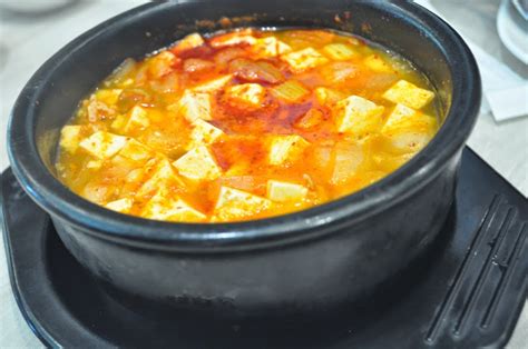 Rice bowl topped with bulgogi (beef), pickled radish, bean sprouts, carrot, lettuce, mushroom, spinach, and egg. Seoulful meal at Kogi Bulgogi Gateway Mall ♥ - Rochelle Rivera