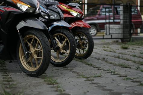 Perpaduan Warna Hitam Dan Emas Pada Motor