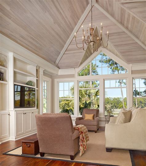 A home's trim says a lot about a craftsman. Stained beadboard ceiling family room beach style with ...