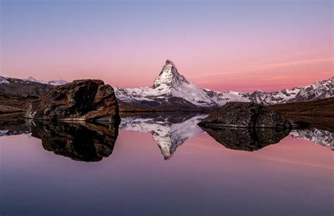 The Matterhorn And Its Reflection In The Stellisee Just Before Sunrise