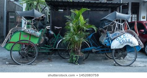 Sleeping in a bicycle taxi in yogyakarta, java, indonesia. "bicycle Rickshaw" Images, Stock Photos & Vectors ...