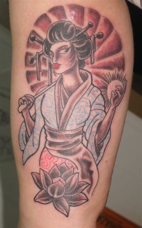 A Woman With A Geisha Tattoo On Her Leg Holding A Flower And An Umbrella