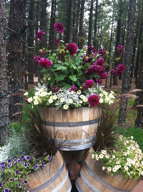 Pin By Meaghan Peveto On Garden Garage Outdoor Rooms Fall Container Gardens Wine Barrel