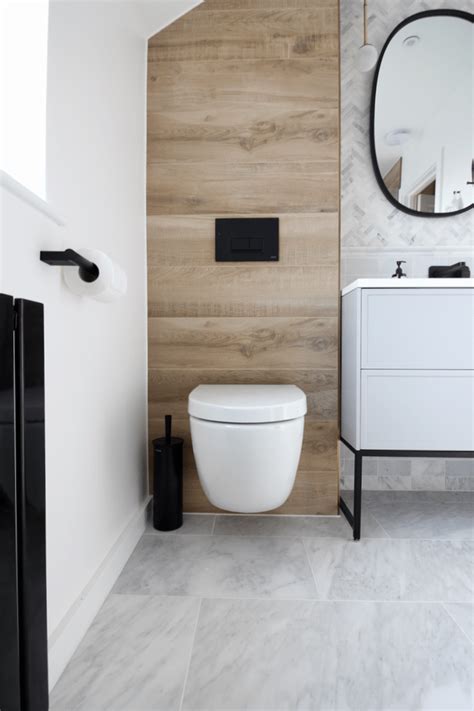 Shop for small bathroom tables online at target. Modern Marble and Wood Bathroom with Black Accents ...