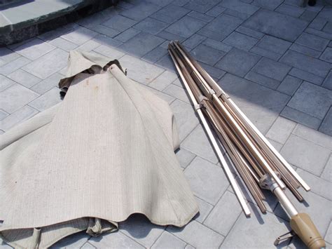 Keep reading to learn how to prevent future algae or mildew growth! DIY by Design: How to Clean Your Patio Umbrella