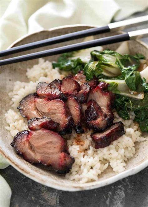 Char Siu Chinese Barbecue Pork Served On Rice With A Side Of Steamed