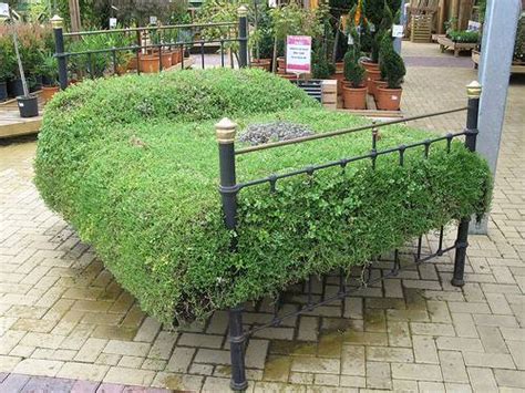 A sweet little bench like this is perfect for a mud room or entryway. Recycling Metal Bed Frames for Flower Beds, 20 Creative ...