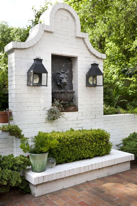 A wall of exposed bricks may look beautiful and sturdy but is quite porous. An English Garden in Montgomery | Brick wall gardens ...