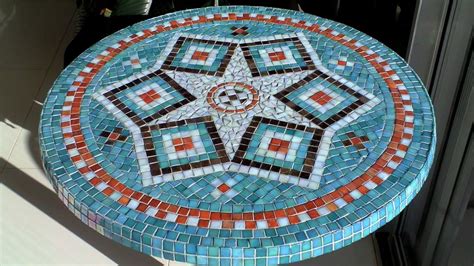 Learn how to make mosaic designs for a table top from ceramic tiles. DIY Mosaic Garden Table | Design, Glue, Grout & Finish ...