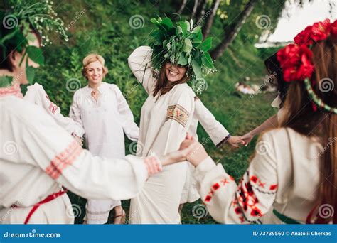 Young Pagan Slavic Girl Conduct Ceremony On Midsummer Stock Photo