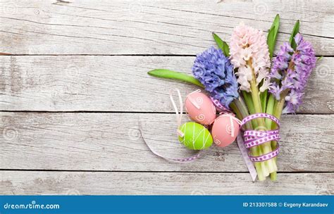 Easter Greeting Card With Easter Eggs And Hyacinth Flowers Stock Photo