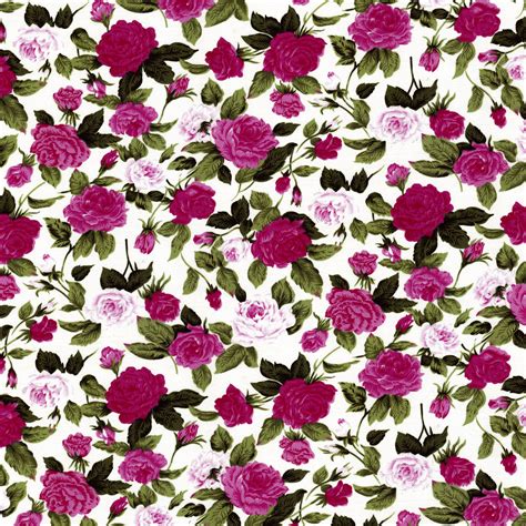 Pink And Red Roses On White Fabric With Green Leaves In The Background
