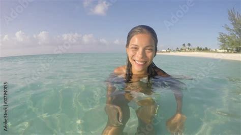 Happy Woman Swimming In Sea On Sunny Day Beautiful Young Wet Female In
