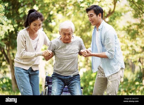 Child Helping Elderly Hi Res Stock Photography And Images Alamy