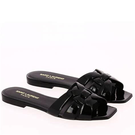saint laurent ysl tribute sandal low in smooth leather with crossed straps black flat