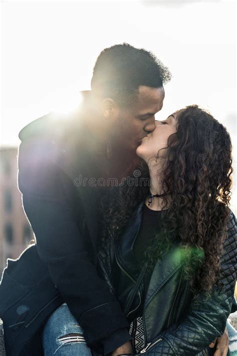 Happy Young Interracial Couple Kissing Stock Image Image Of Kiss Madrid 246175865