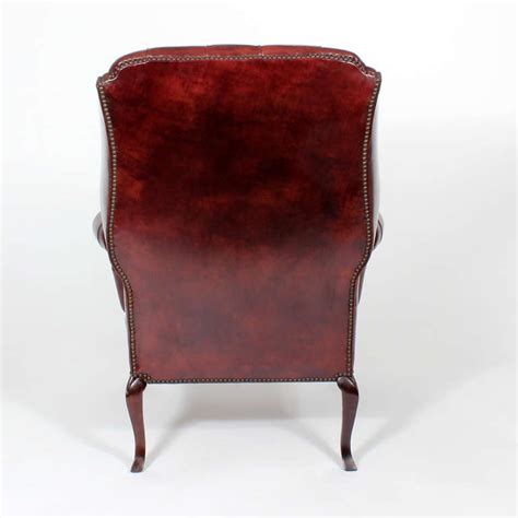 Chesterfield chair wing back antique style oxblood red leather armchair. Pair of Red Leather Tufted Wing Chairs at 1stdibs
