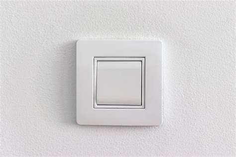 Single White Light Electric Switch On A Wall Stock Photo Download