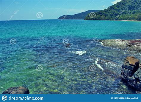 Coral Clear Sea Tropical Wild Shore Mountain Landscape Stock Photo
