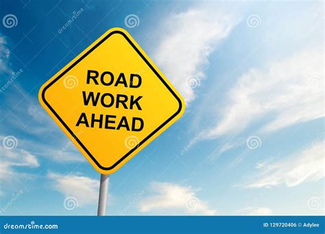 Road Work Ahead Road Sign With Blue Sky And Cloud Background Stock