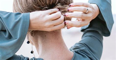 Photo Of A Person Fixing Her Hair · Free Stock Photo