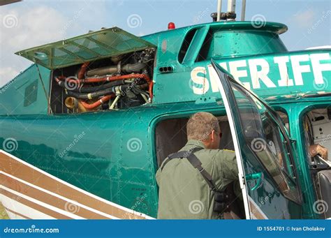 Sheriff Deputy Climbing Into Police Helicopter Stock Image Image Of