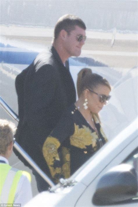 jet set mariah carey and james packer were seen landing in sydney after flying from melbourne