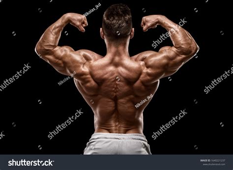 Muscular Man Showing Back Muscles Rear Foto De Stock Editar Ahora