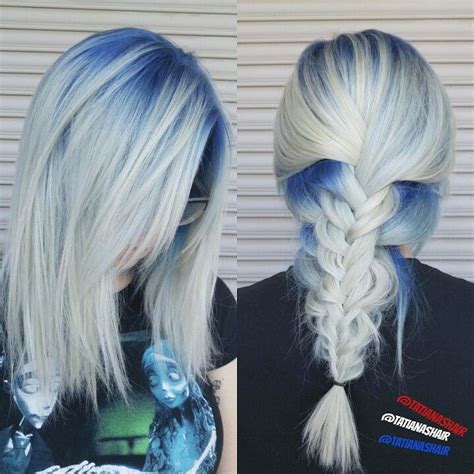 These black hair shades with ultra reflective blue tones are a striking way to accent your hair color. Blonde hair with blue roots #fishtailbraid #icyblonde ...