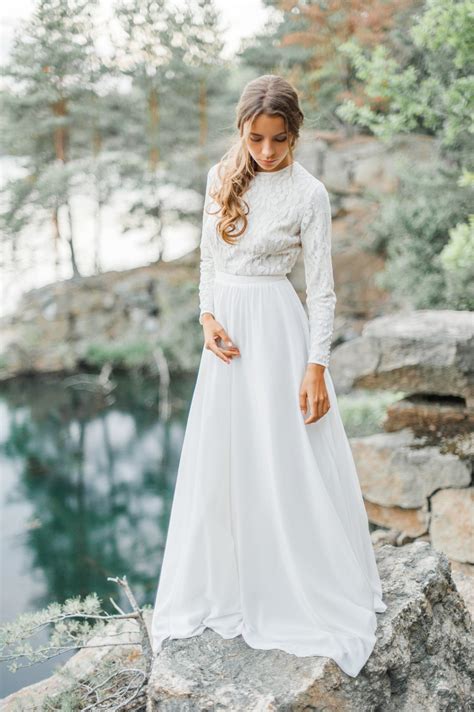 And a lace wedding dress is one of those trends. Wedding dress with high-neck bodice and long lace sleeve ...