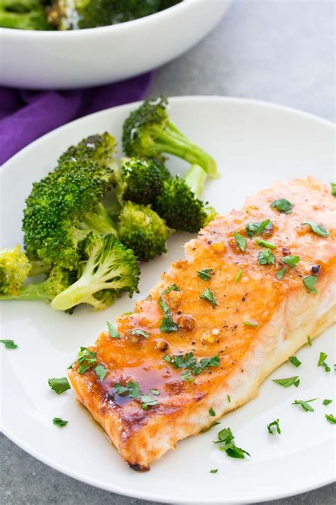 Sprinkle the bread crumbs over the fillets. This easy oven baked salmon recipe is our favorite! With a ...