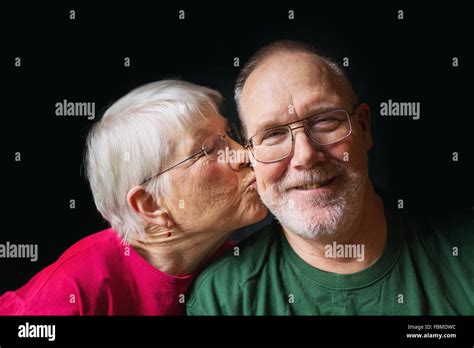 Senior Woman Kissing Man Hi Res Stock Photography And Images Alamy