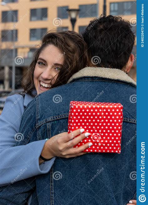 Close Up Overjoyed Wife Hugging Husband Thanking For Romantic Present
