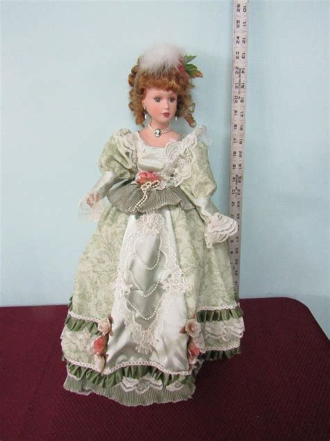 LOT SOUTHERN BELLE PORCELAIN DOLL WITH A CAMEO NECKLACE EstateSales Org