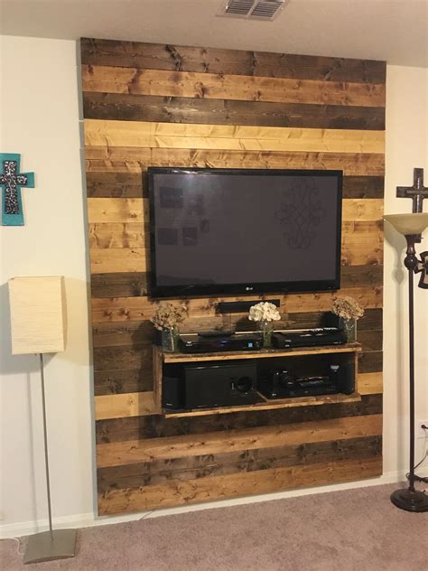 5 diy rustic wood pallet tv stand. TV Wall I made from 1x6 boards. | Tv wall, Wall behind tv