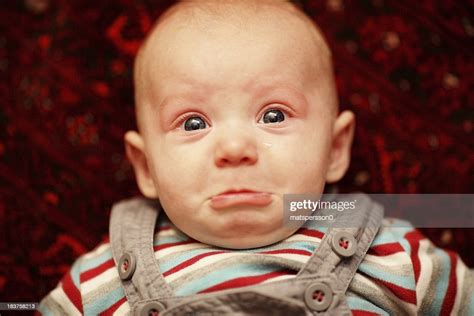 Sad Baby High Res Stock Photo Getty Images