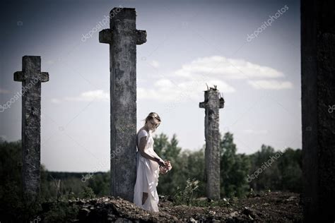 Sad Girl Near The Cross — Stock Photo © Bigdan 3477732