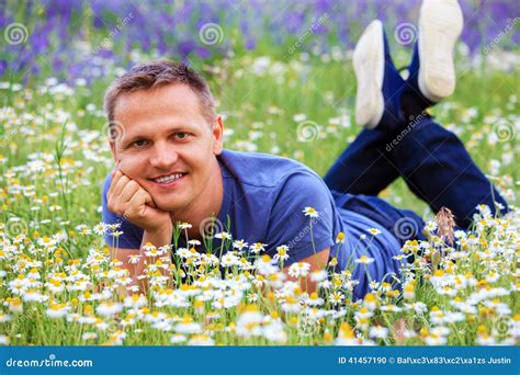 Portrait Of A Man In A Flowery Meadow Stock Photo Image Of Field