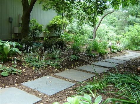 With modern house designs, you can always choose simple and sleek lines that complement the clean look. simple paver walkway | Gardening and Outdoors | Pinterest