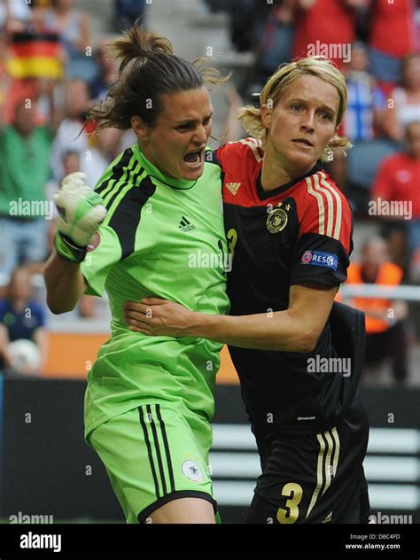 Goalkeeper Nadine Angerer L And Saskia Bartusiak Of Germany React After Angerer Saved A