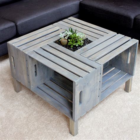 After creating a coffee table frame from lumber and fibreboard, attach old wooden pickets to the exterior with wood hometalk blogger laura jane fox used wood varnish to polish off her diy coffee table made from four crates turned on their sides, but you can. DIY Wine Crate Coffee Table | Home and Heart DIY